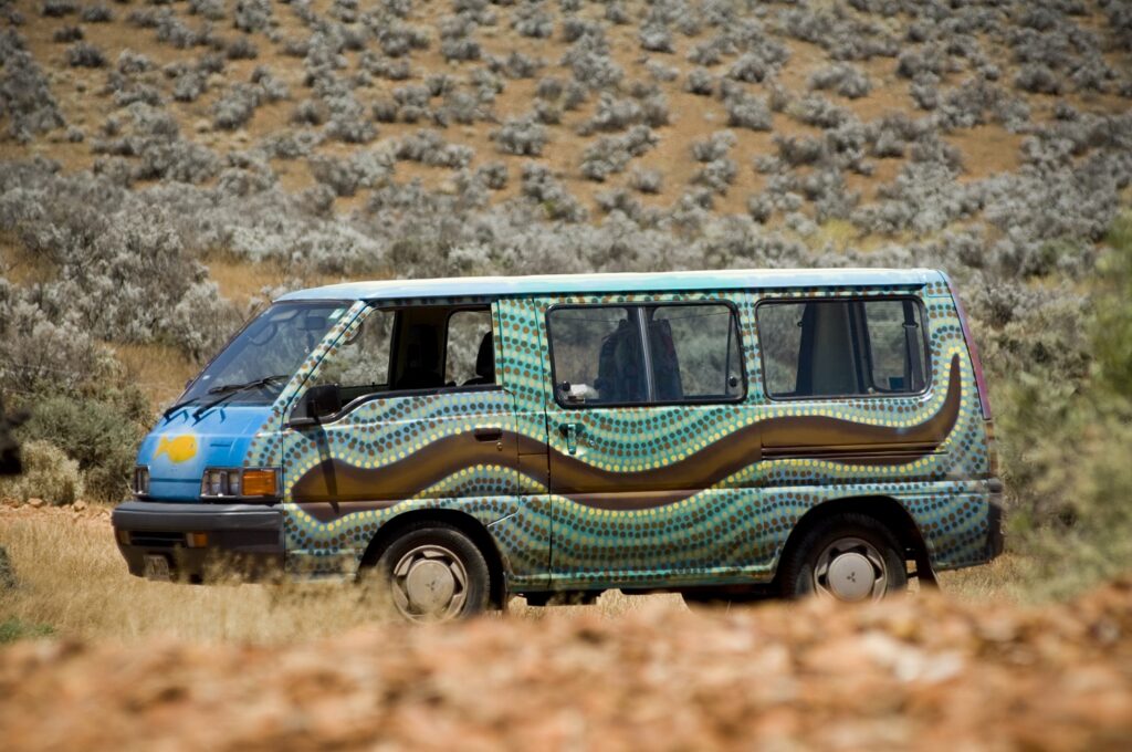 Art on Wheels, photo by Randy Larcombe, van painted by James Cochran and Willy Carbine